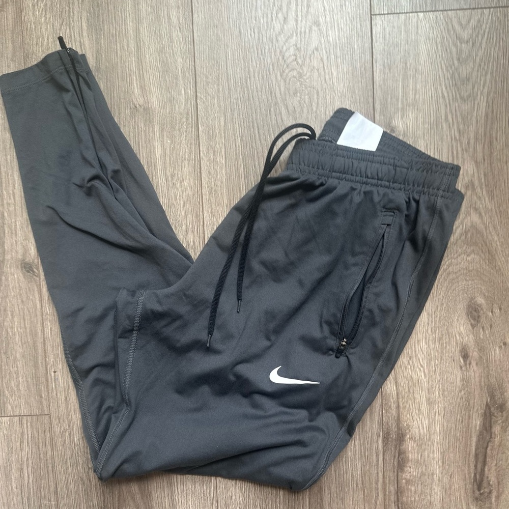 Nike Dri Fit Women's Charcoal Track Joggers with White Swoosh - Picture 4 of 13